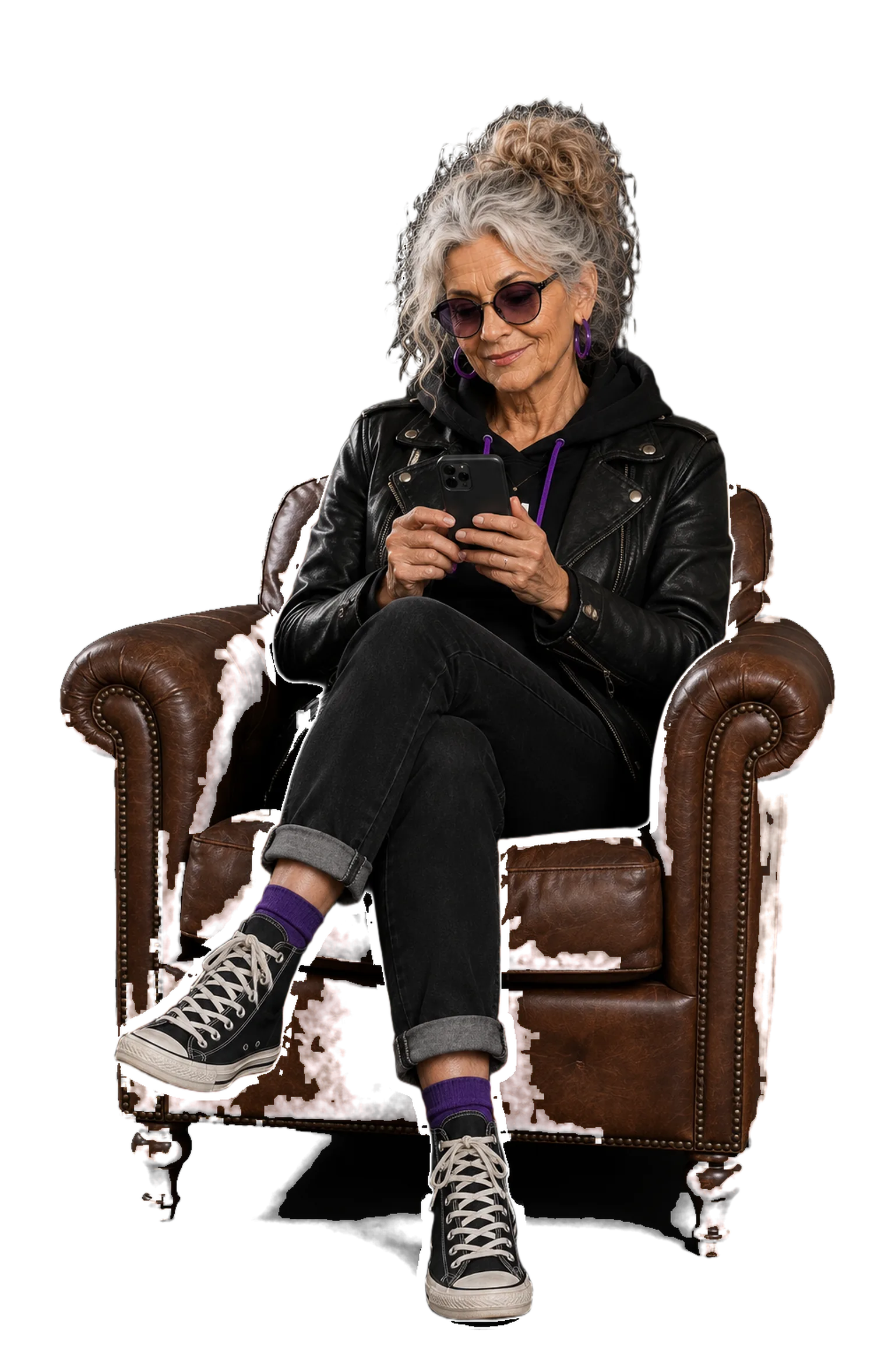 GrandMa in an armchair, answering on her phone